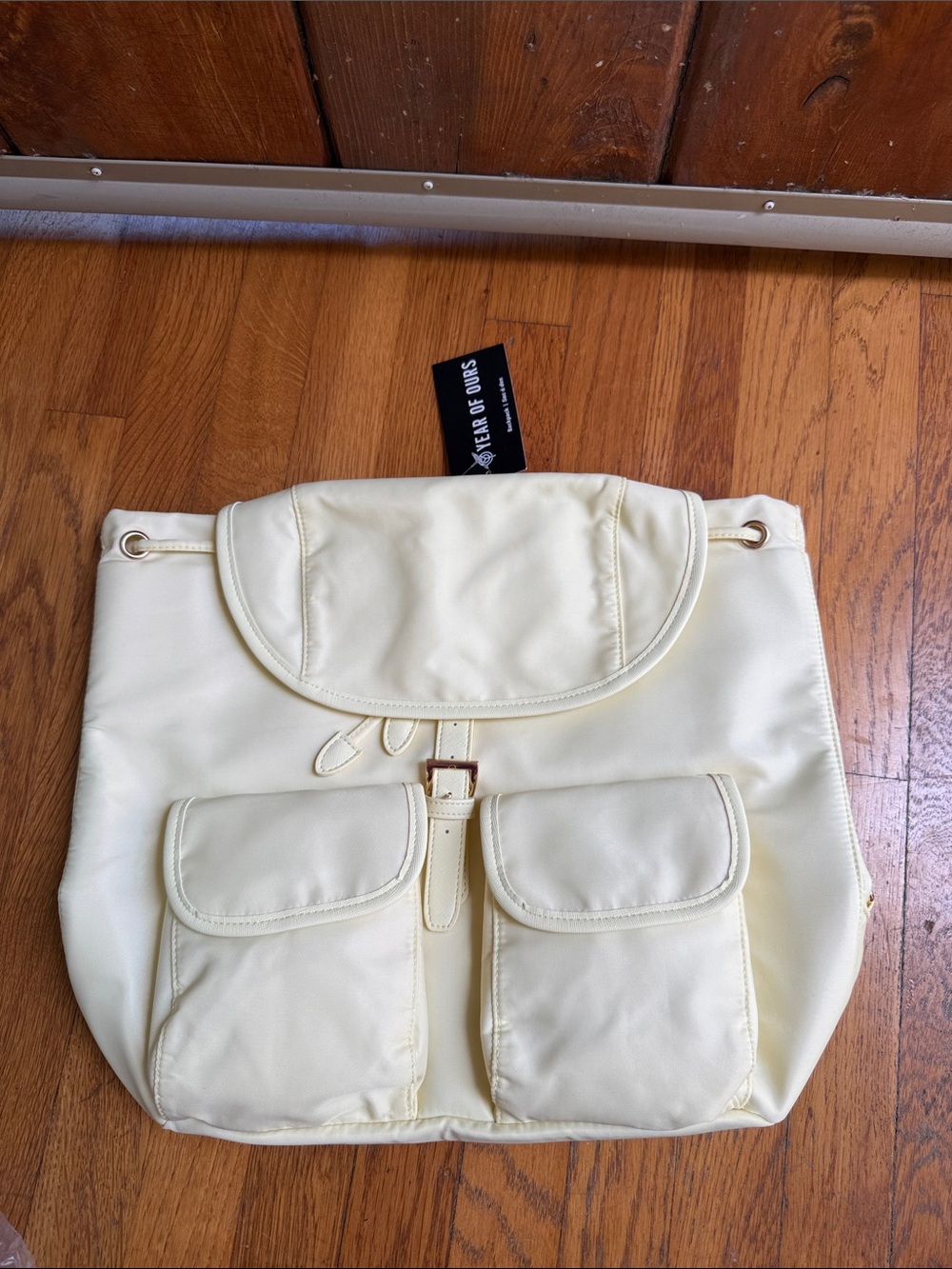 Year of Ours Cream Drawstring Backpack with Front Pockets